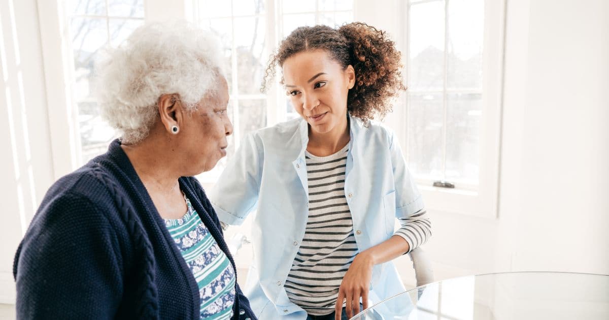 caregiver with elderly woman
