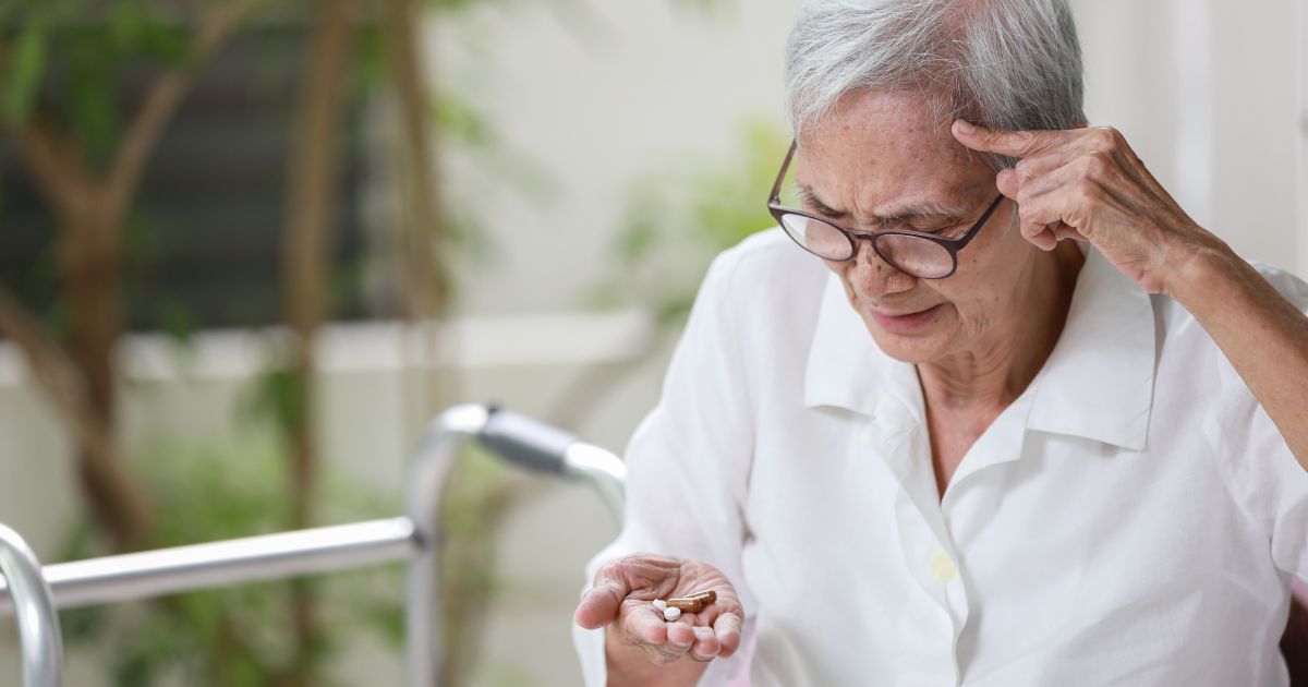 elderly woman showing signs of Alzheimer's and Dementia Care
