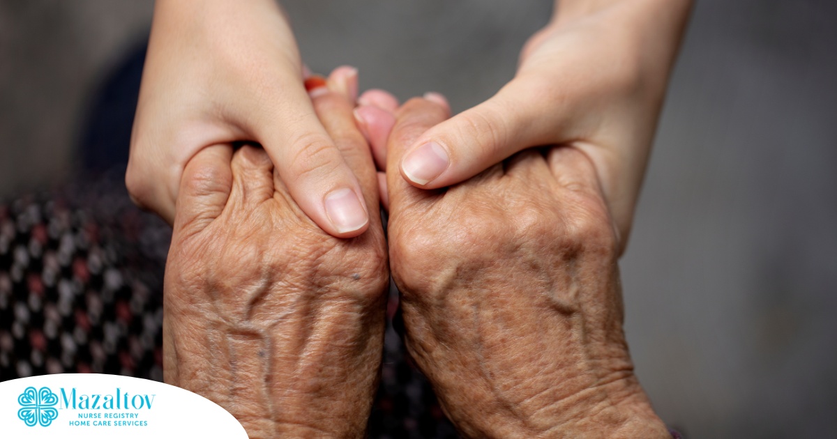 Younger hands hold older ones, representing the care and compassion of caregiving and how caregivers can help, even in ways like implementing stroke prevention strategies.
